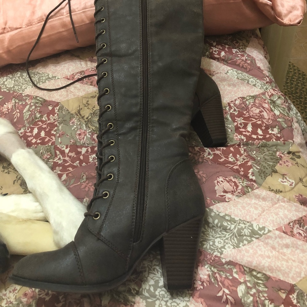 Tall lace up boots